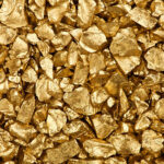 "High resolution image of gold nuggets, studio lit for maximum detail. Also, a similar image with more nuggets:"